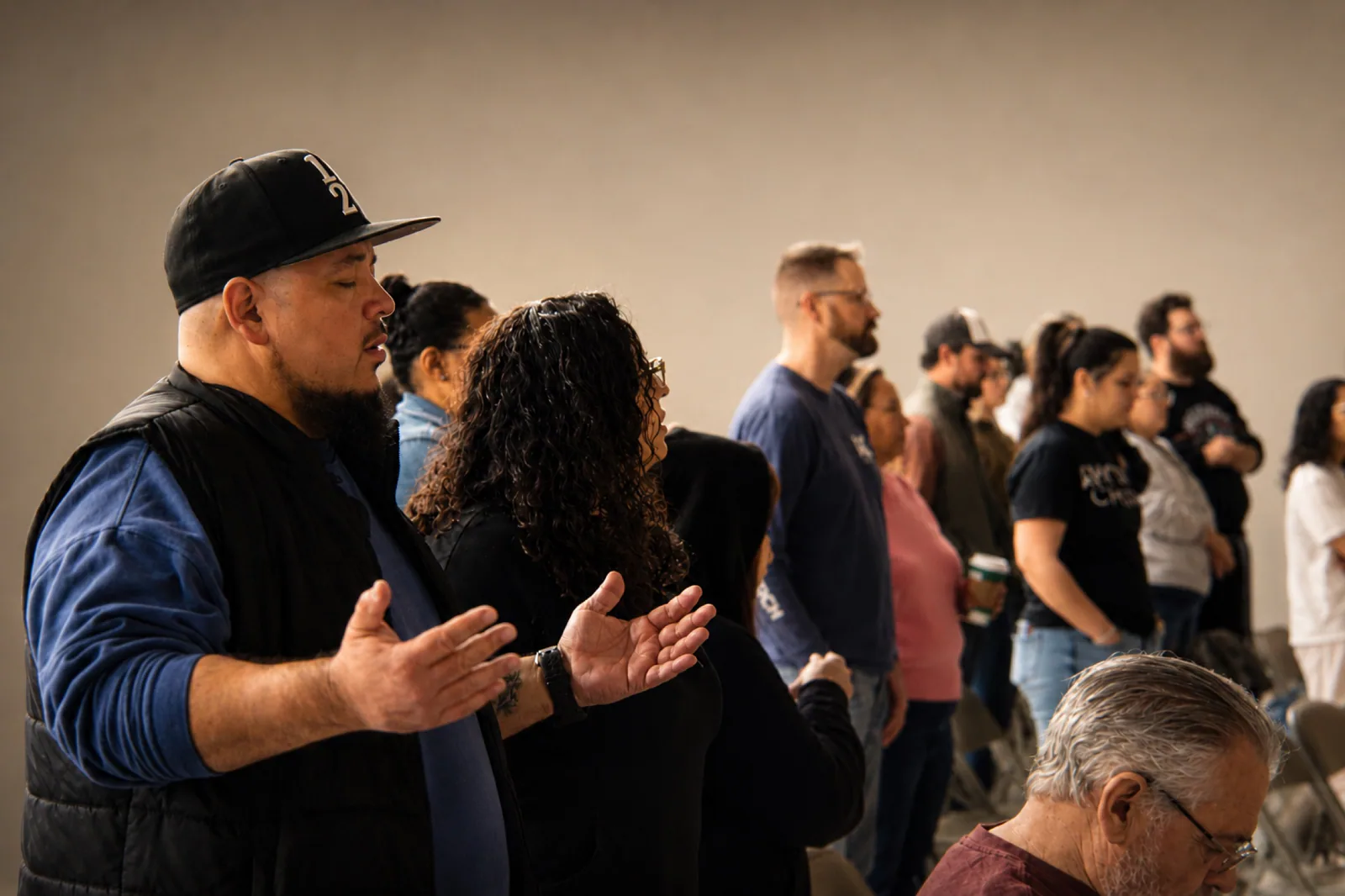 Rhythm Church people praying together