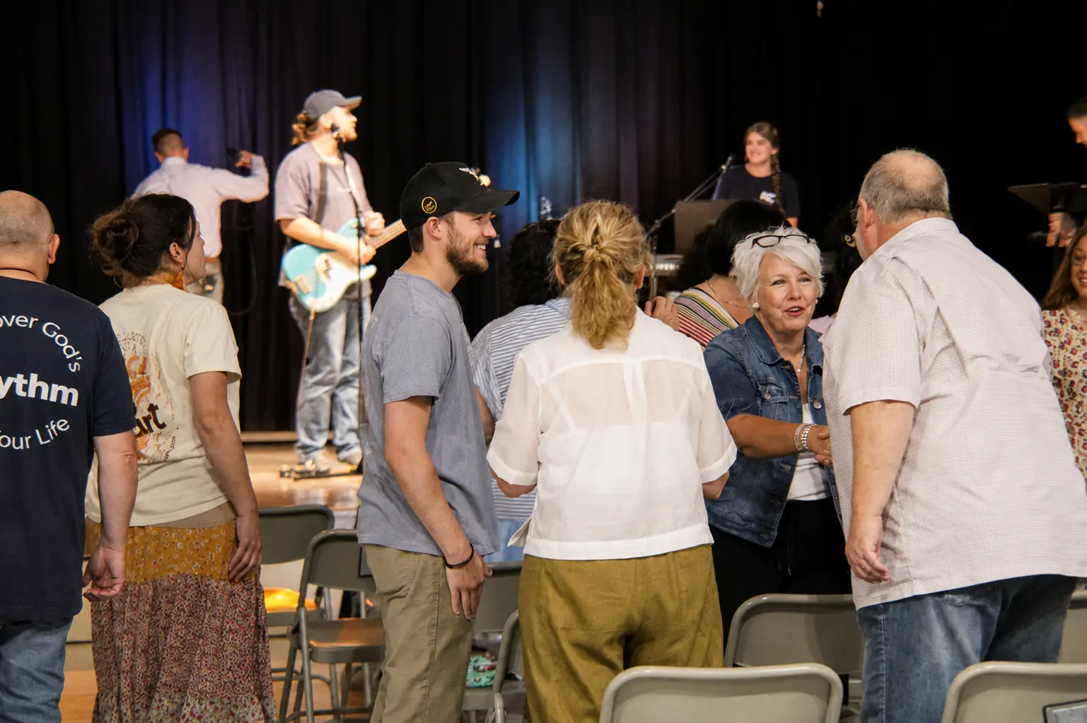 People connecting after a Rhythm Church service