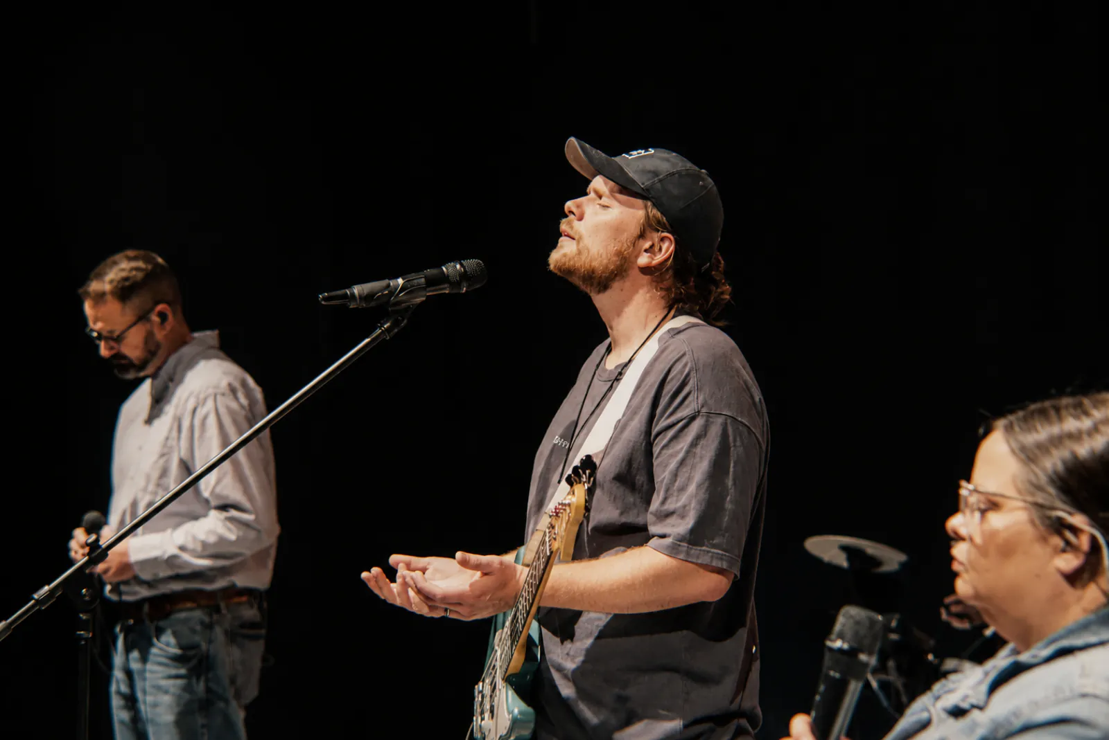 Rhythm Church worship team members serving during a service
