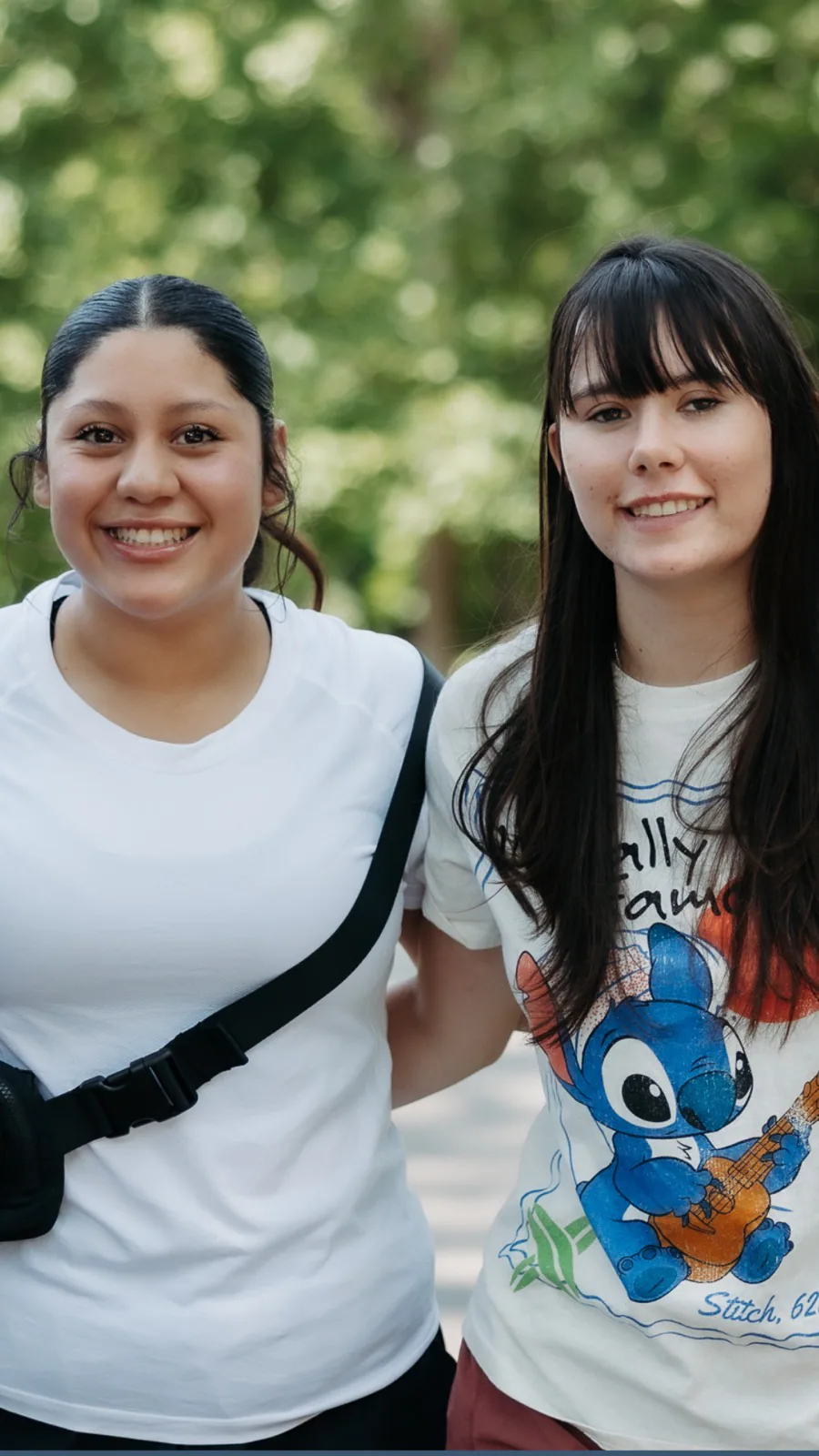 Students smiling outside